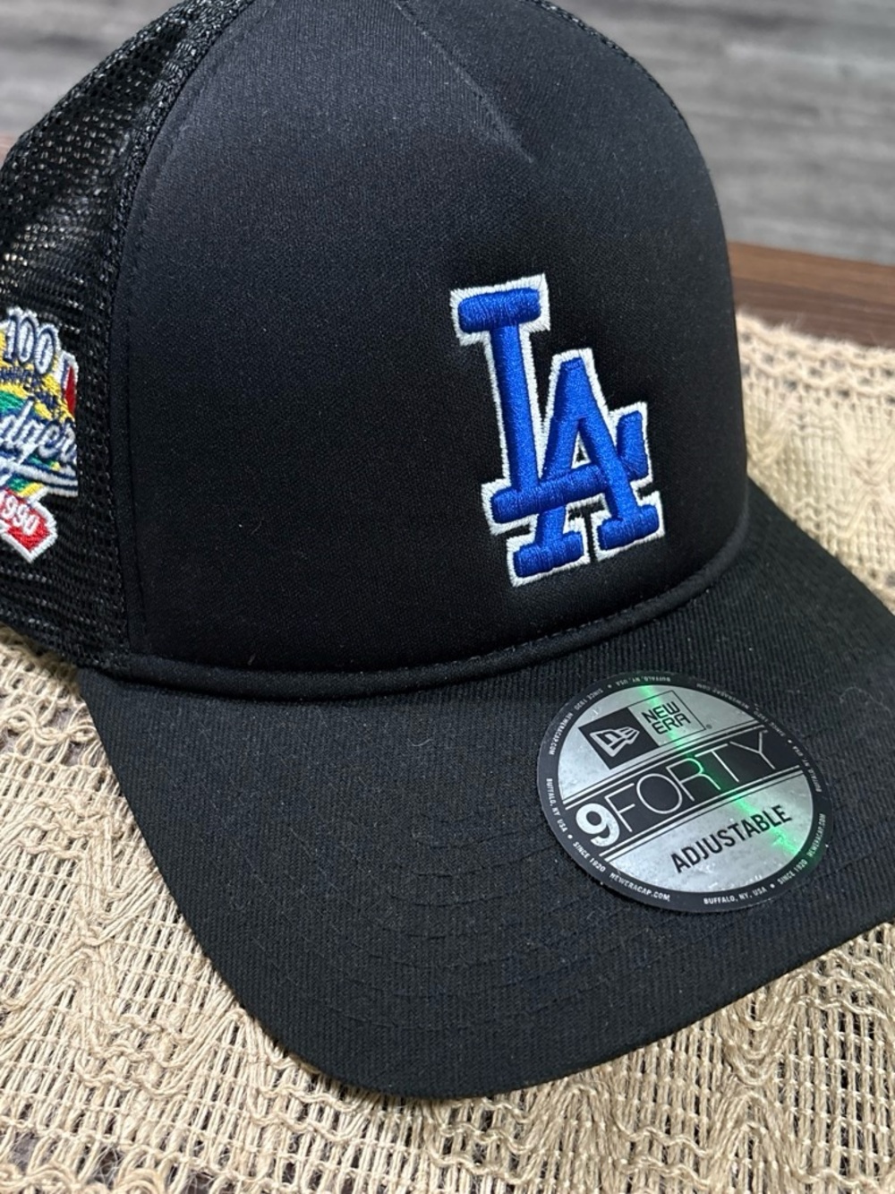 New Era Black Trucker Hat with Blue LA Logo